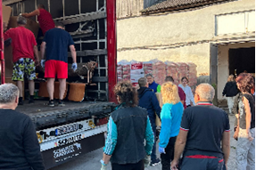 Descarcare camion St Polten la Comat - Lions Club Bistrita